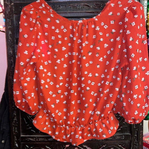 Red Blouse with White Floral design - Picture 3 of 3